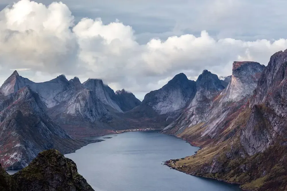 A fjord surrounded by large rocky mountains
