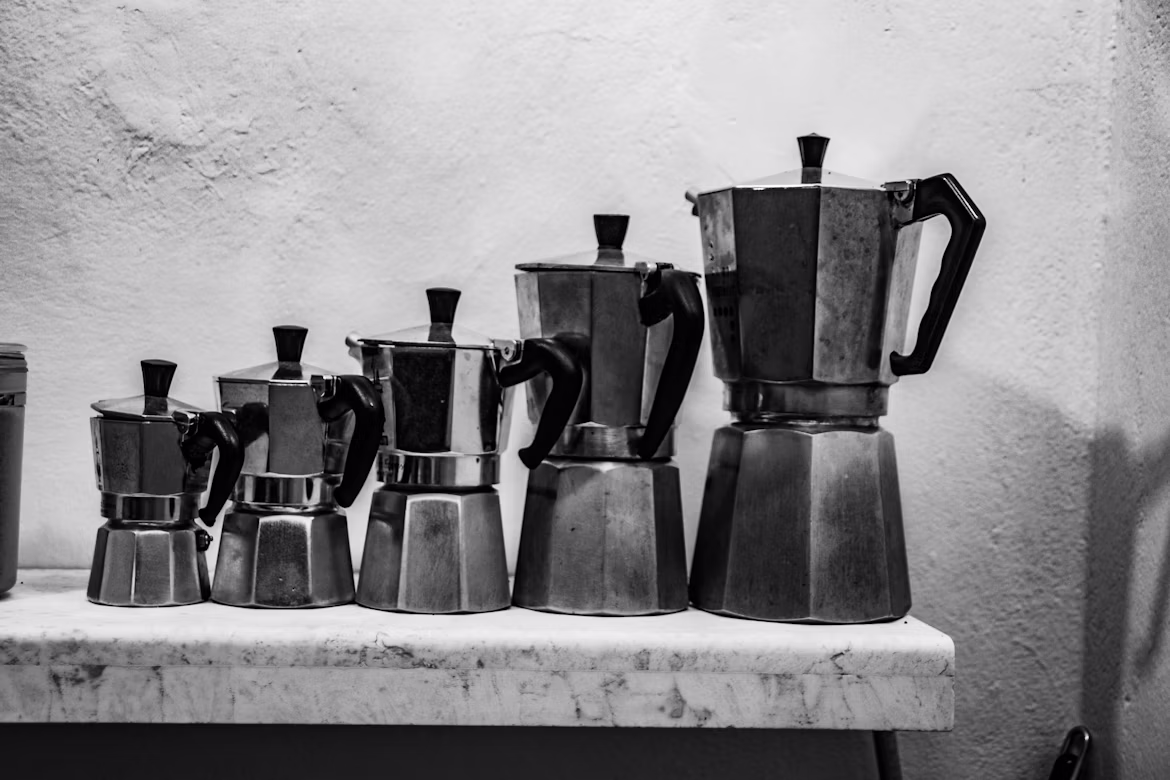 A set of traditional Italian moka pots used for brewing coffee