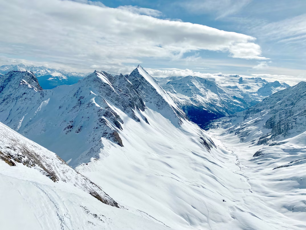 the snow-capped slopes of Courmayeur