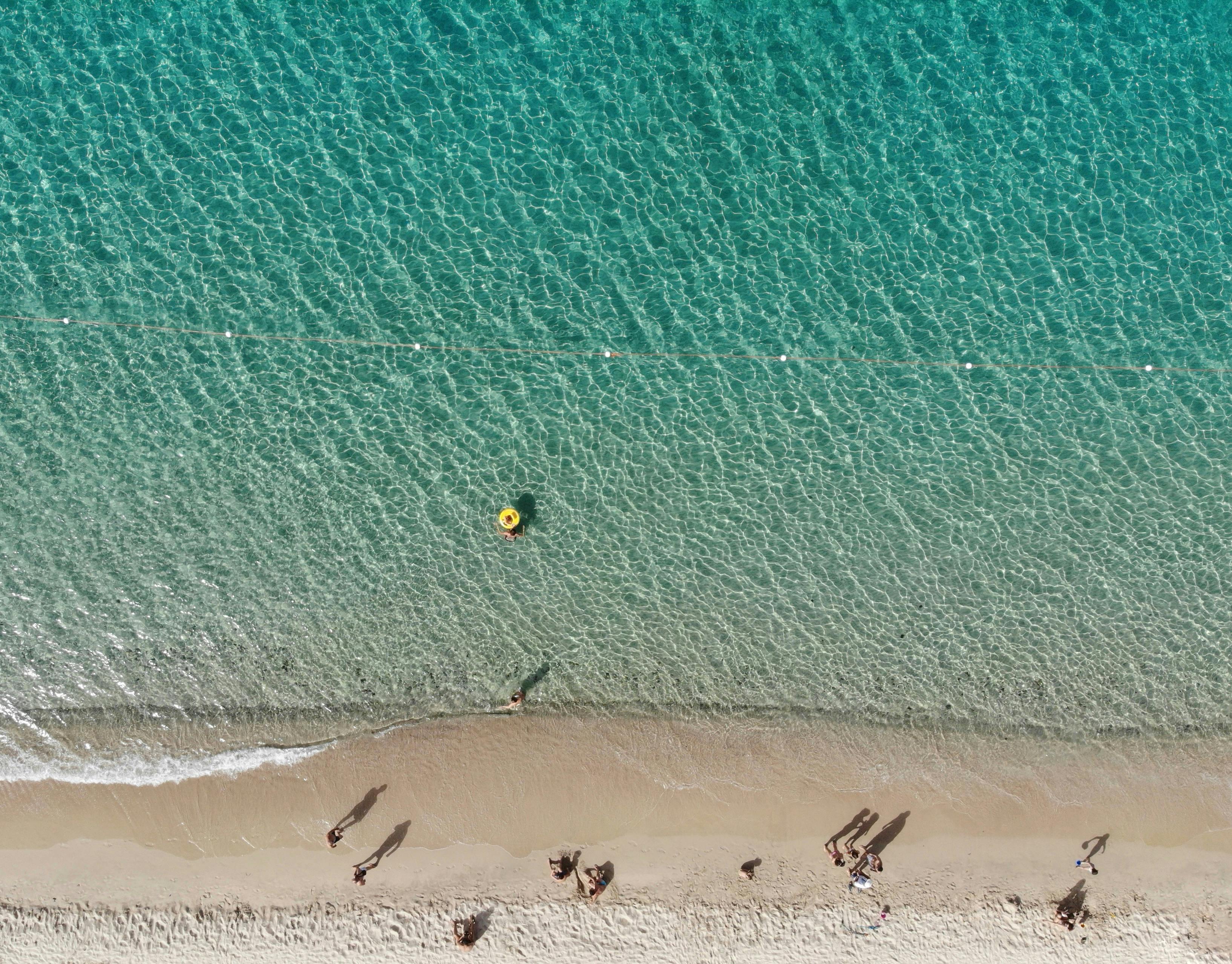 Geremeas con bagnanti, Sardegna..jpg
