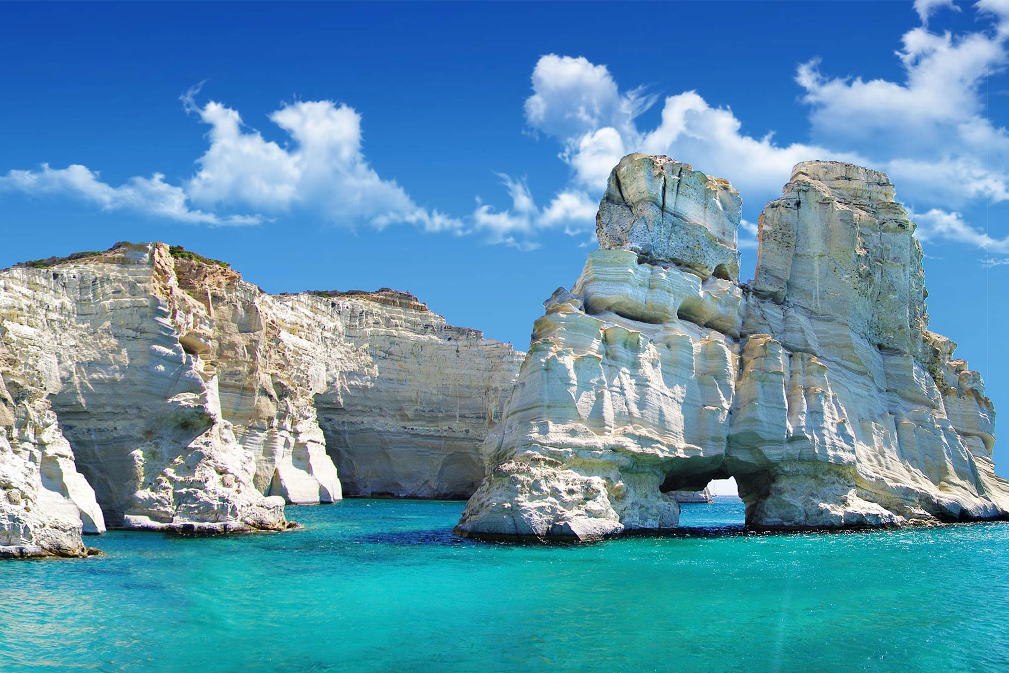rock formations in the water in Milos