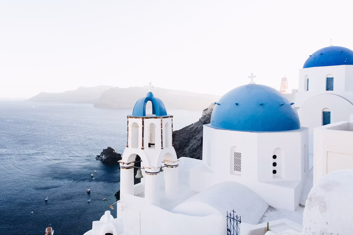 Oia, Santorini at sunset.avif