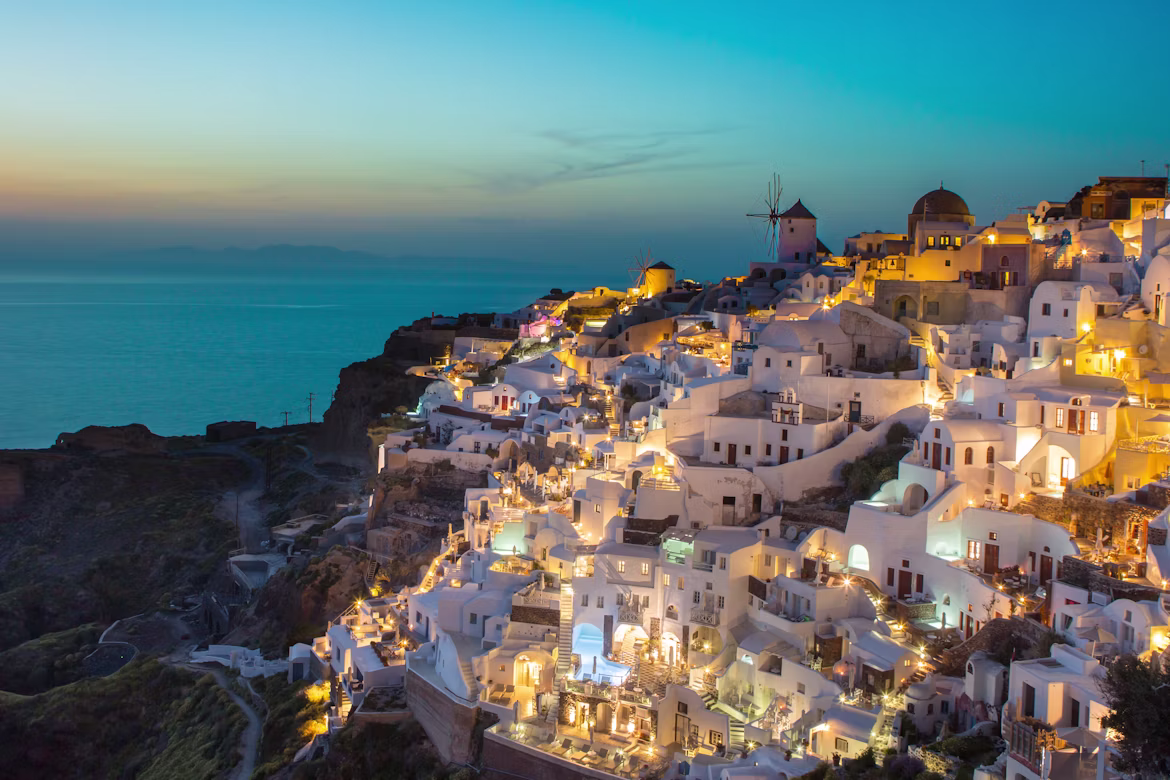 Oia illuminated at sunset
