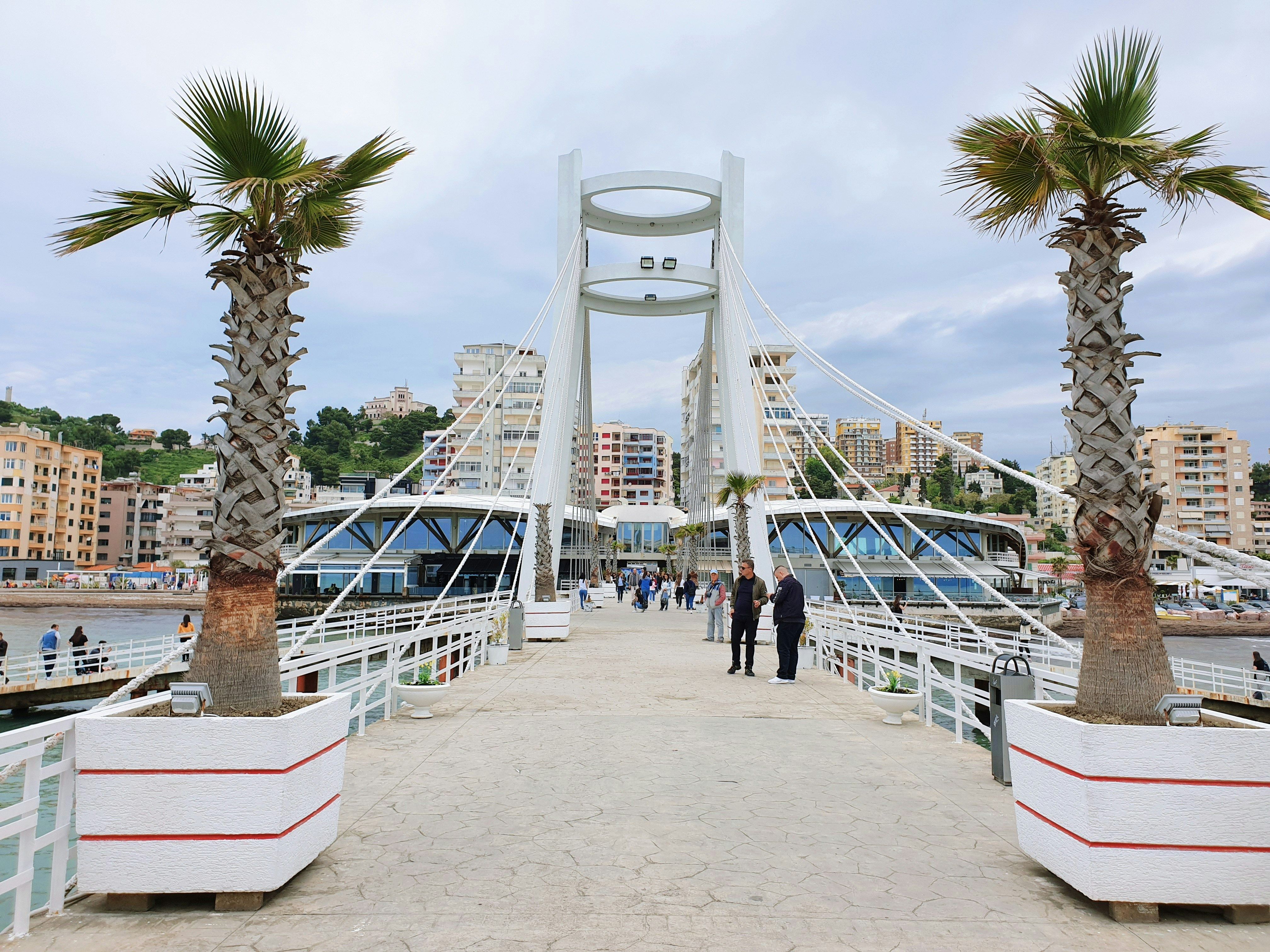 palm trees on a bridge in Durres