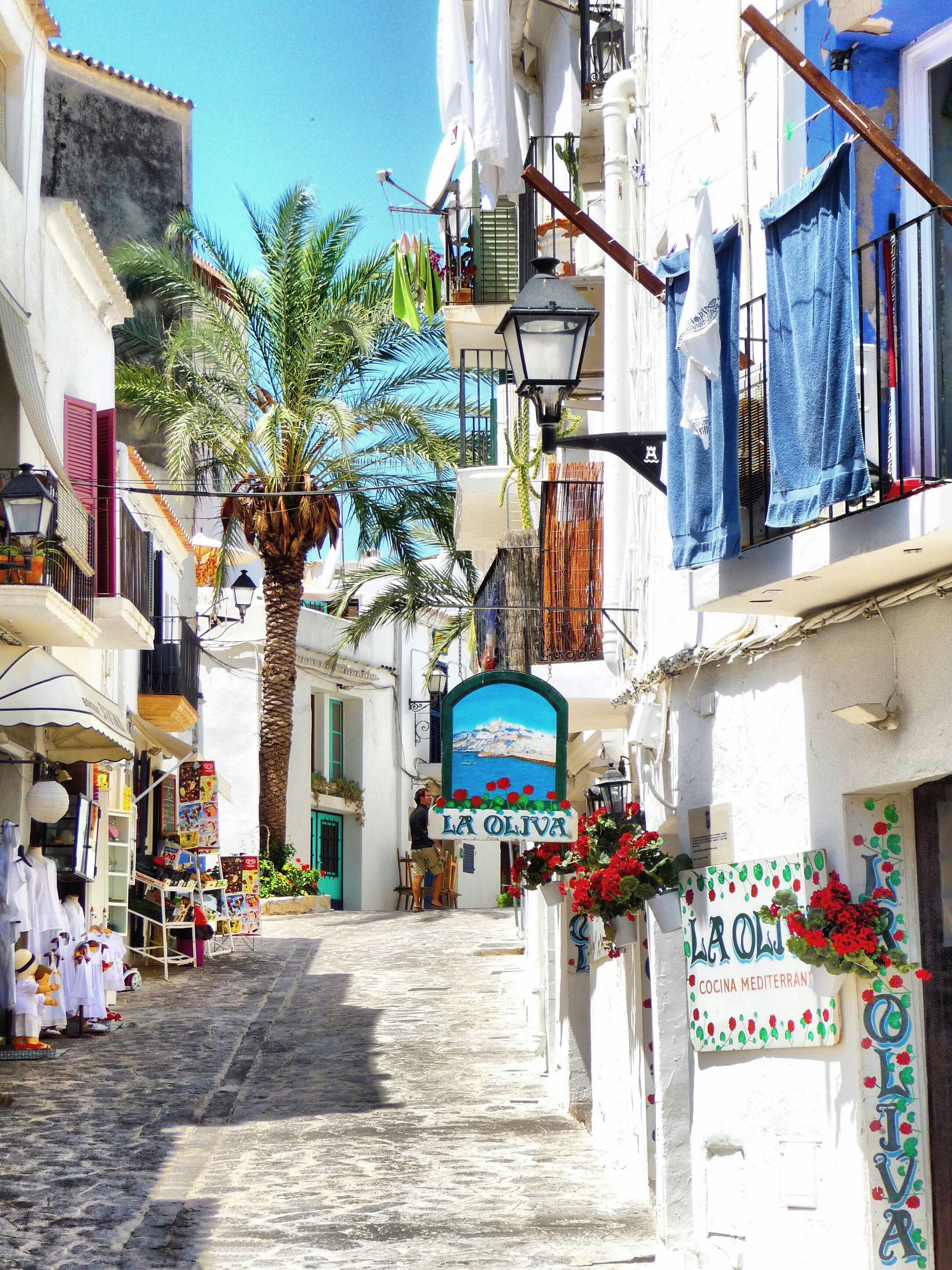 blue and white cobbled street in Ibiza Town