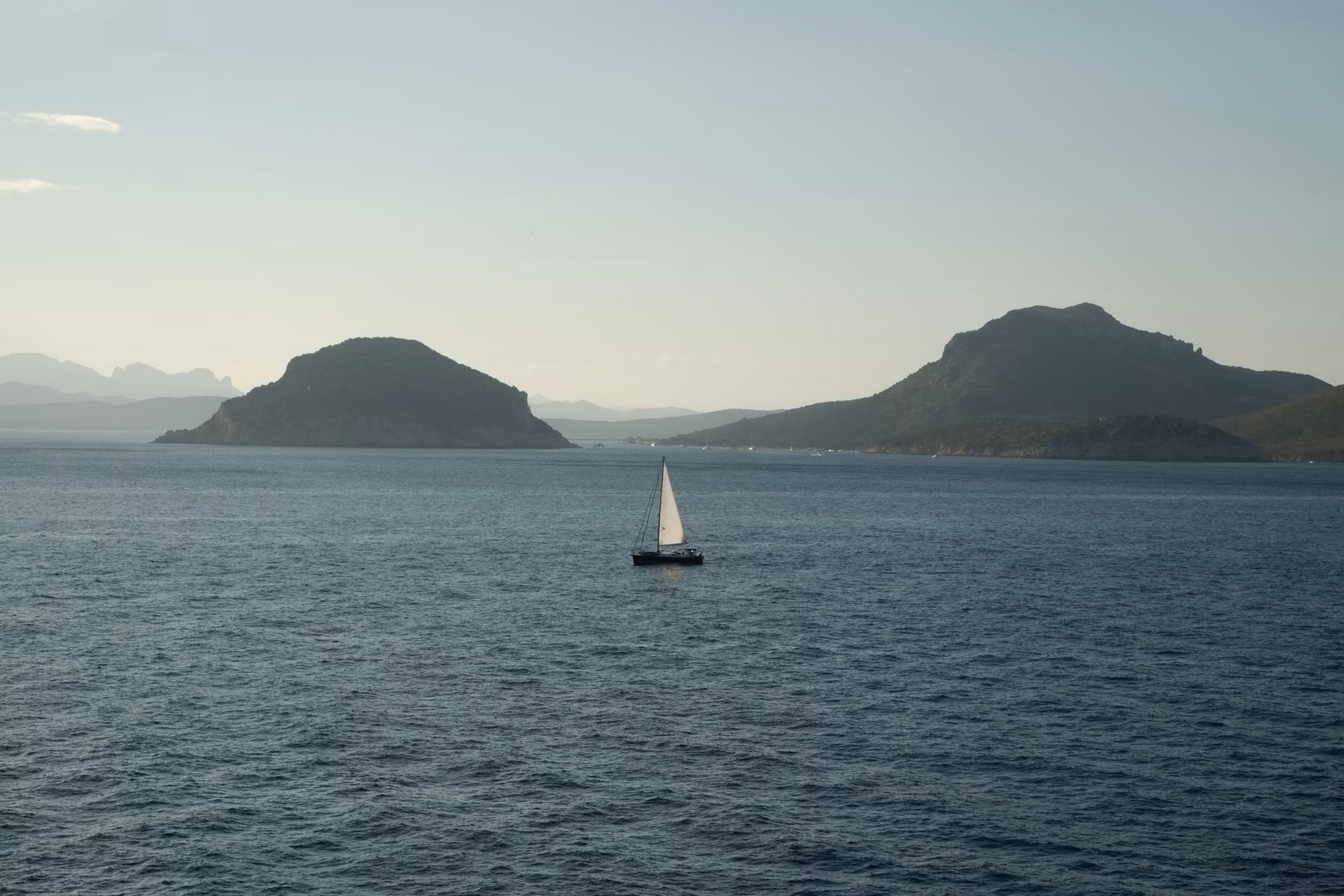 boat sailing in olbia.avif