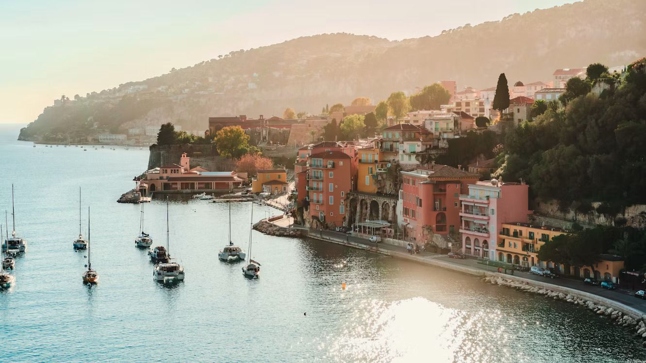 boats docked beside colourful villas in Villefranche-sur-Mer.jpg