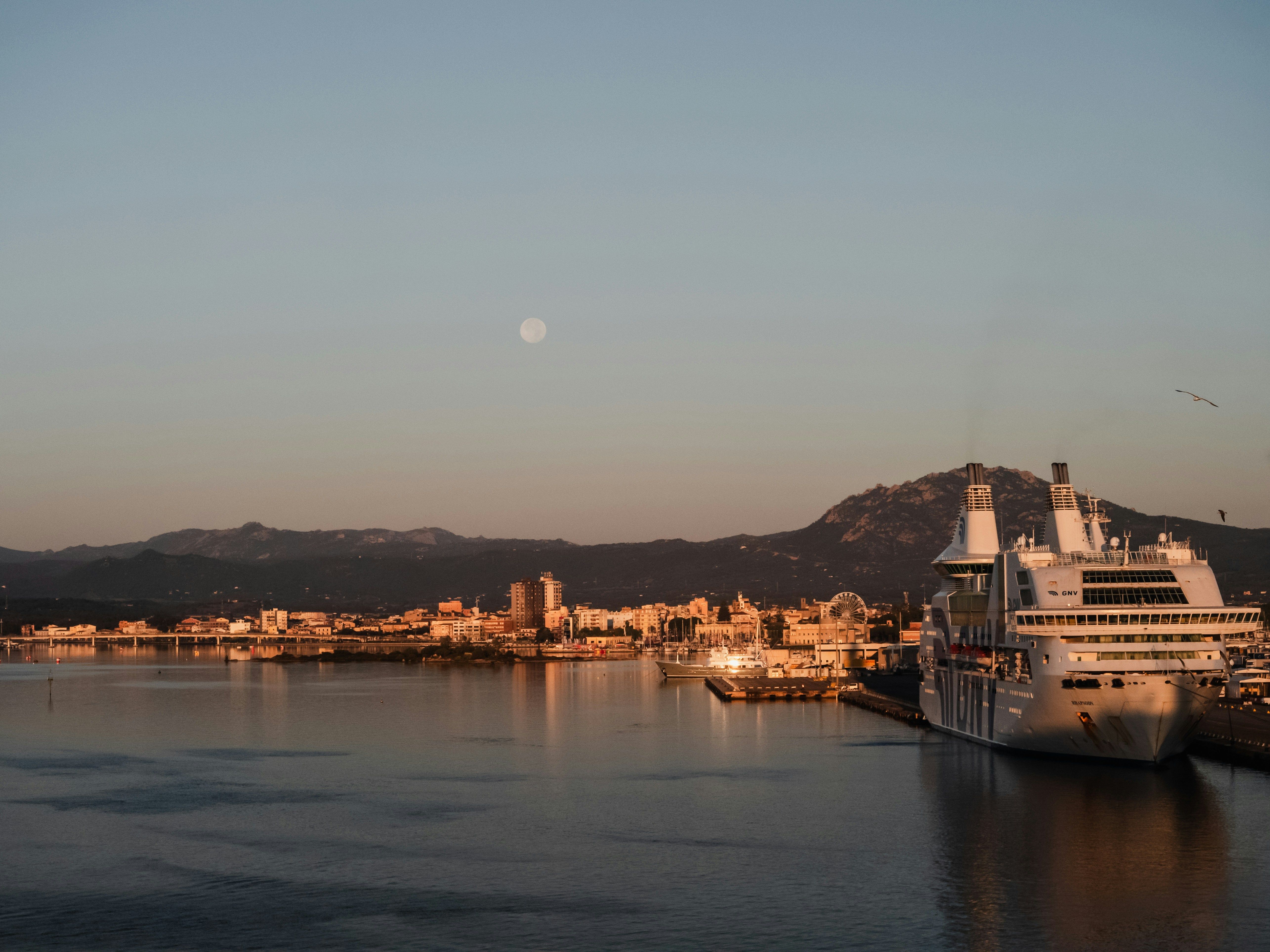 ship docked on the coast of Olbia