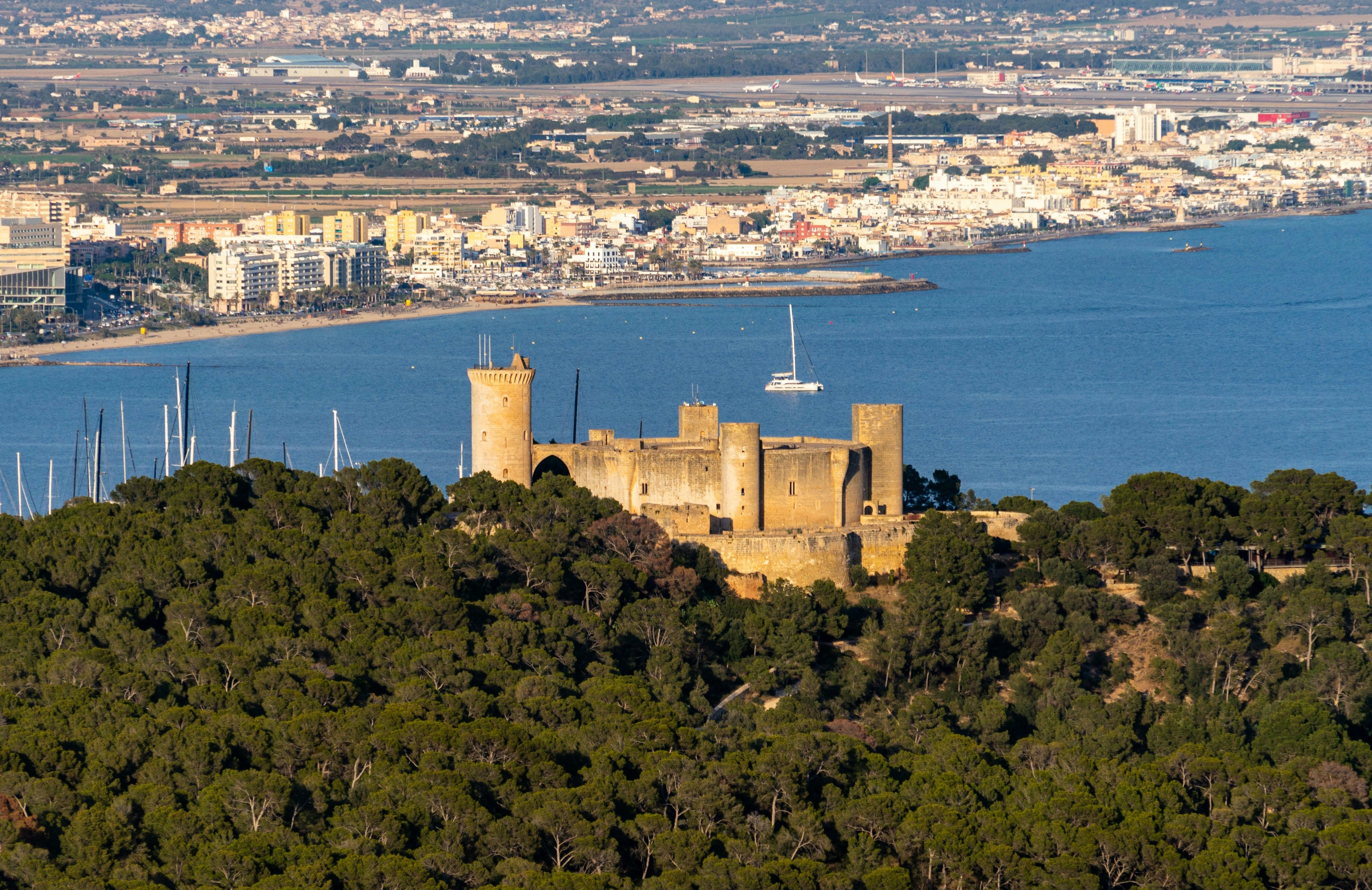 Carrer Castell de Bellver in Palma with the city behind