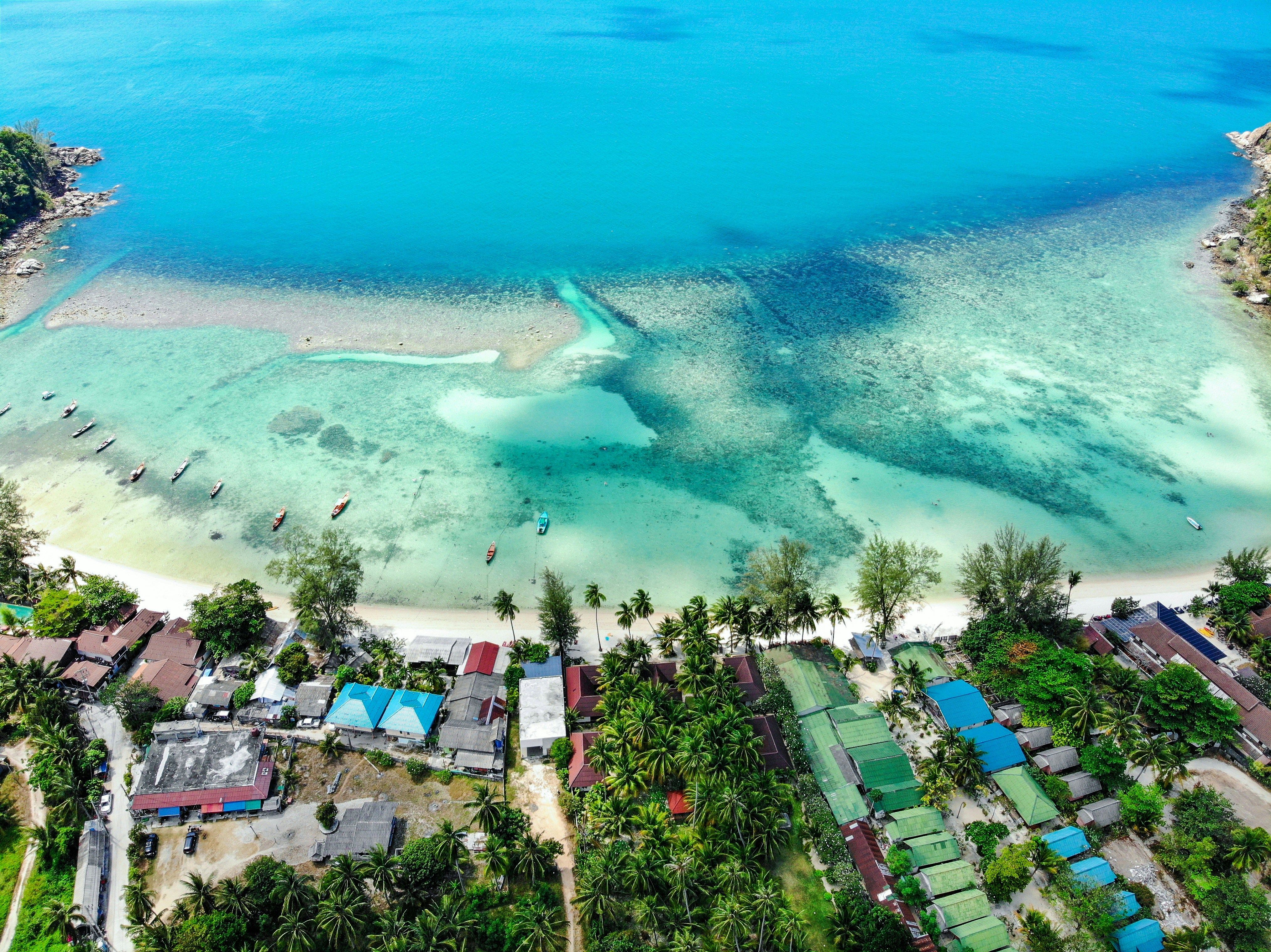 sandy bay with clear waters in Koh Phangan