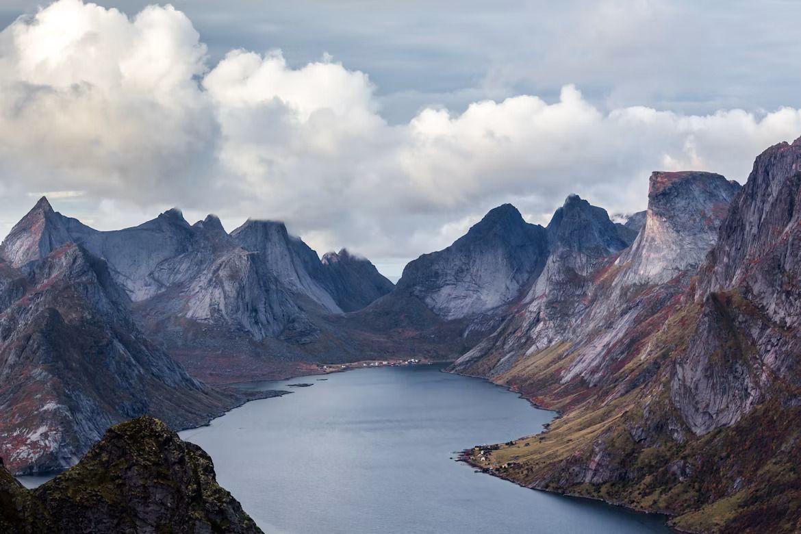 A fjord surrounded by large rocky mountains