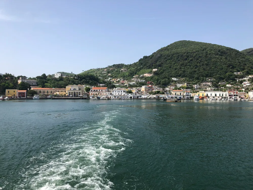 ripples in the sea with Ischia town in the background