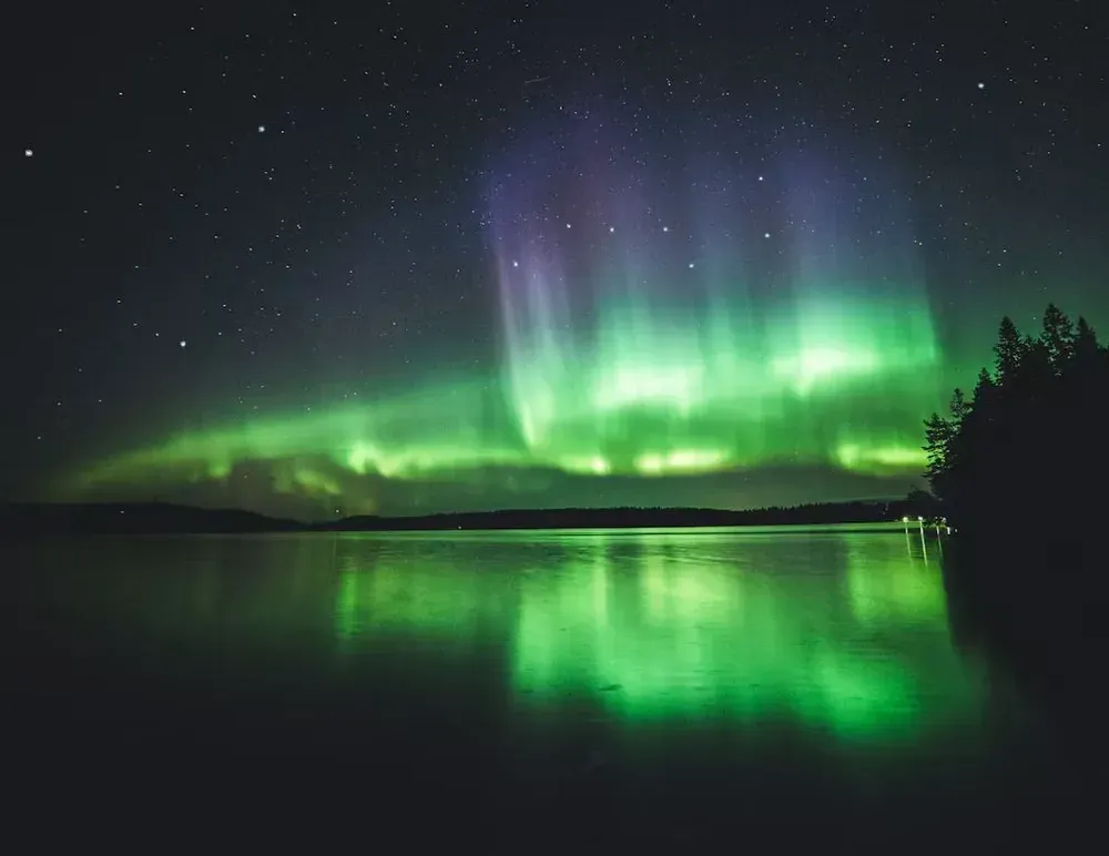 the green auroras of the Northern Lights seen in Kuopio, Finland