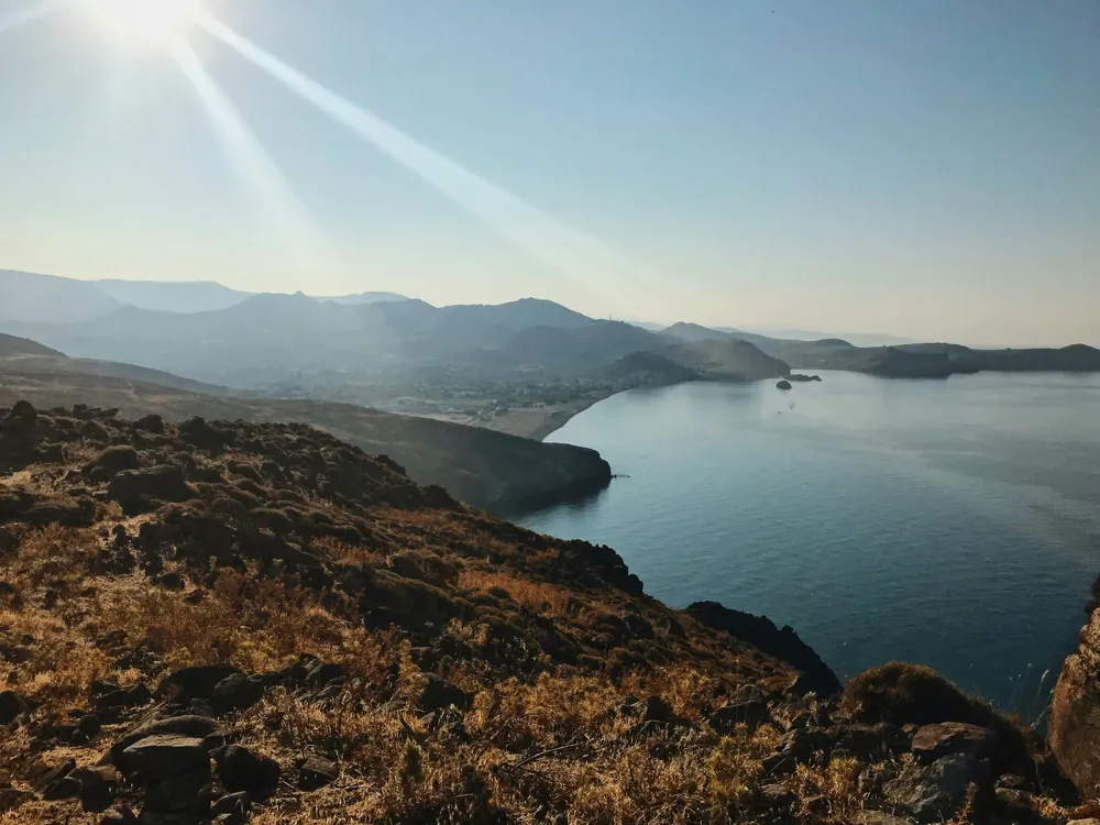 sun over the mountains in Lesvos