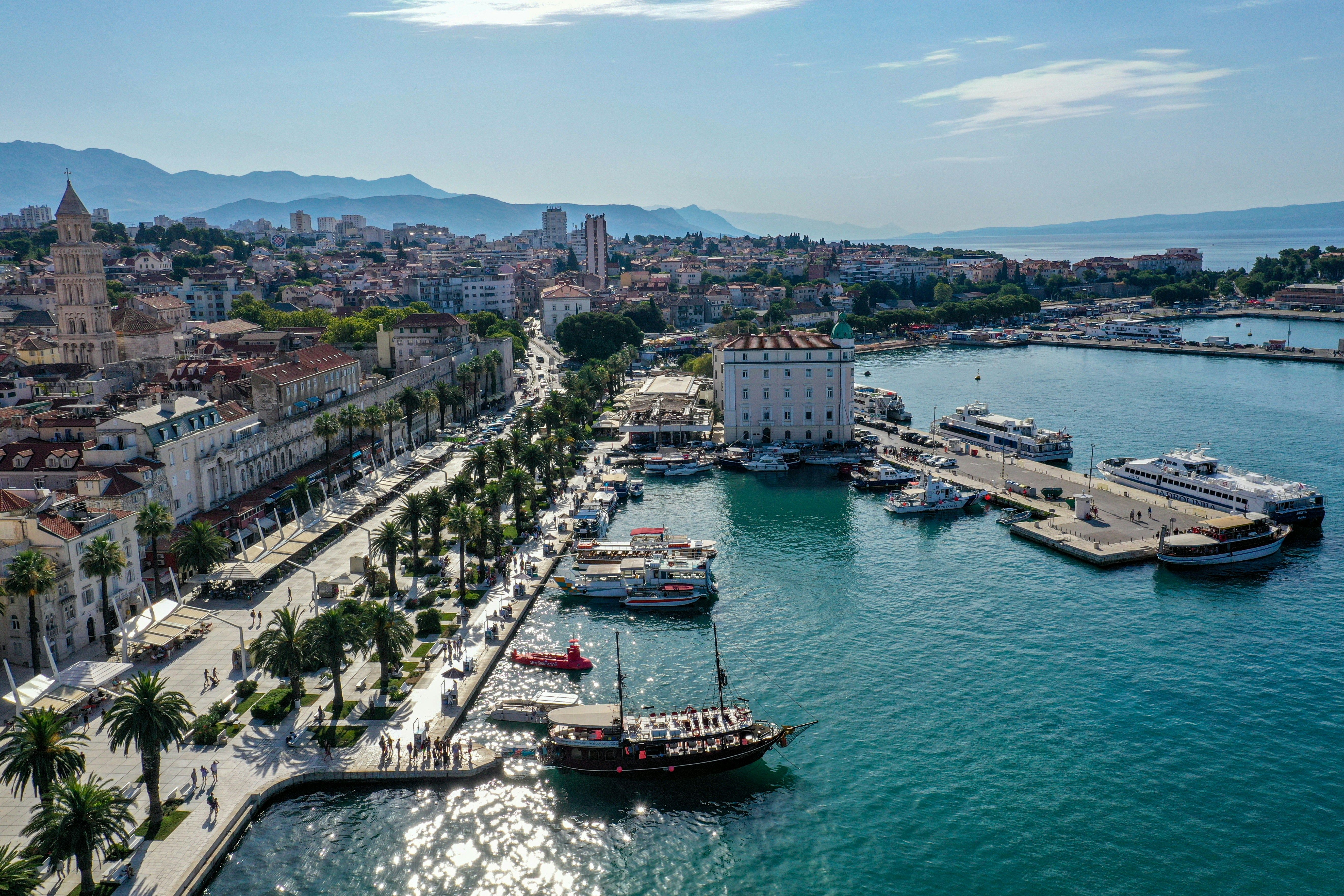 boats docked along the waterfront in Split