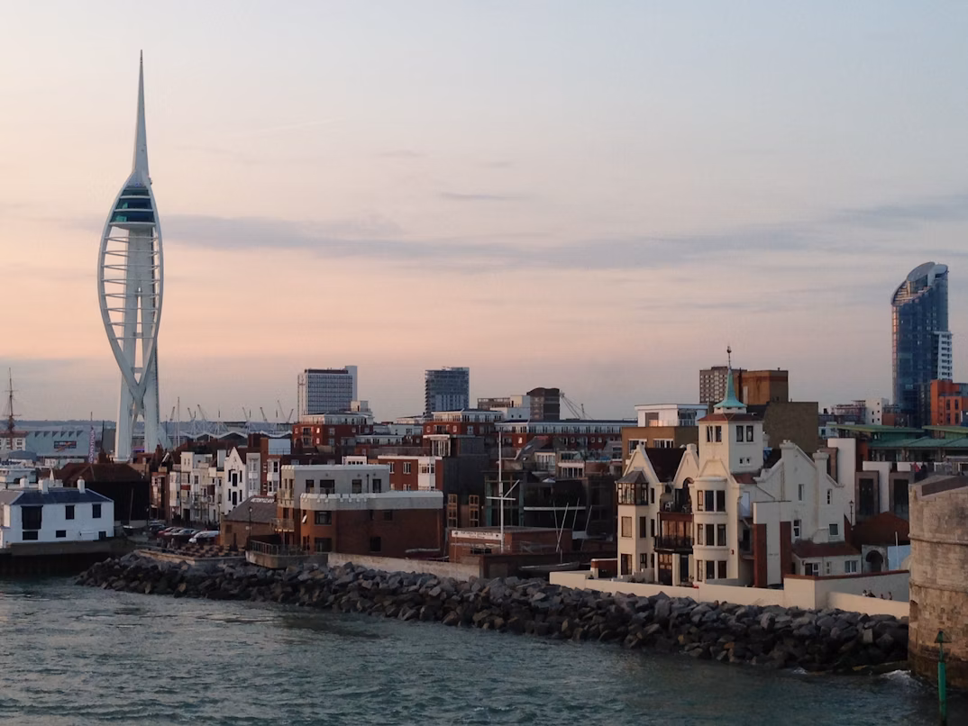 view of the waterfront in Portsmouth at sunrise