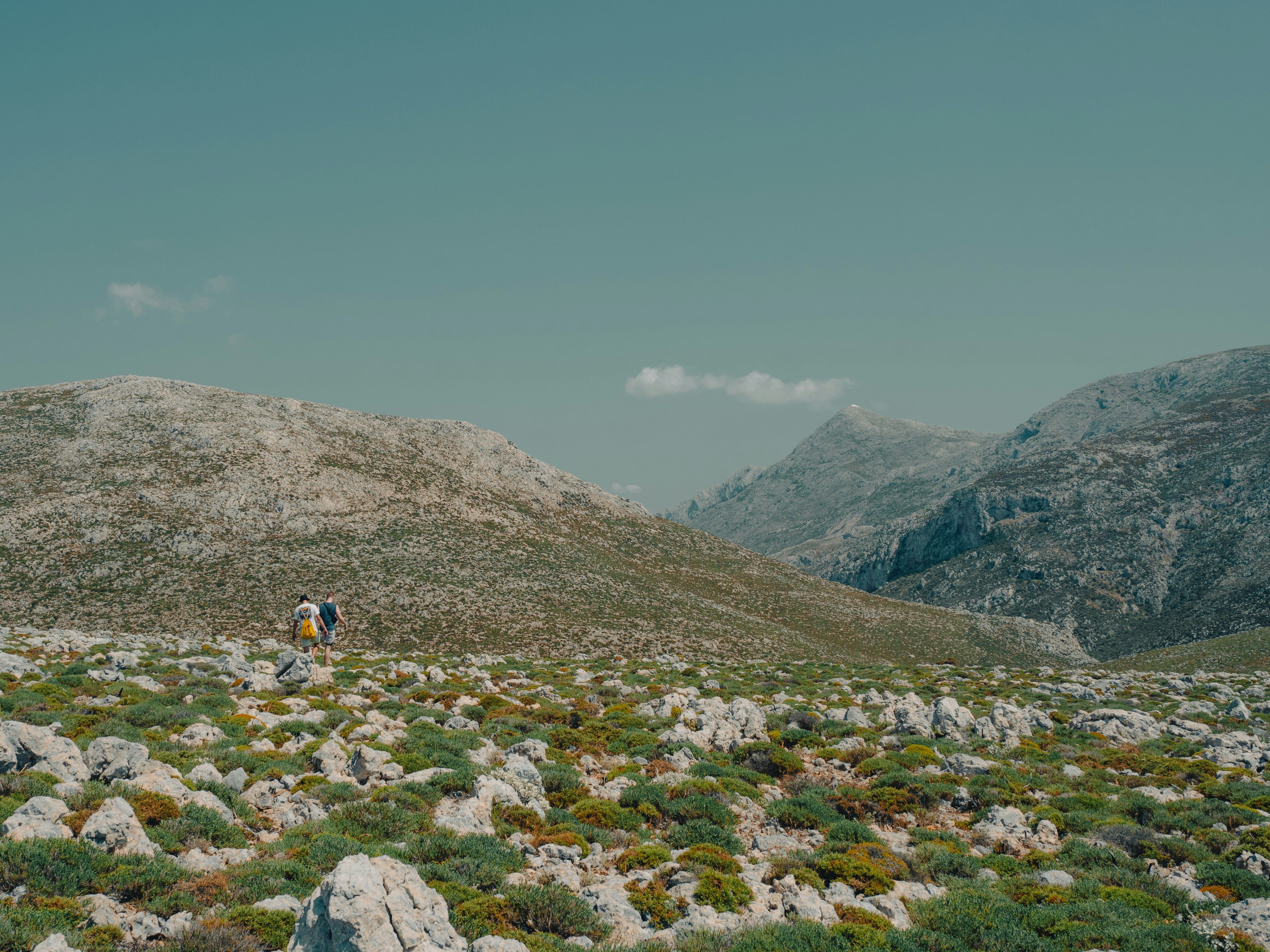people walking through the mountains in Kalymnos
