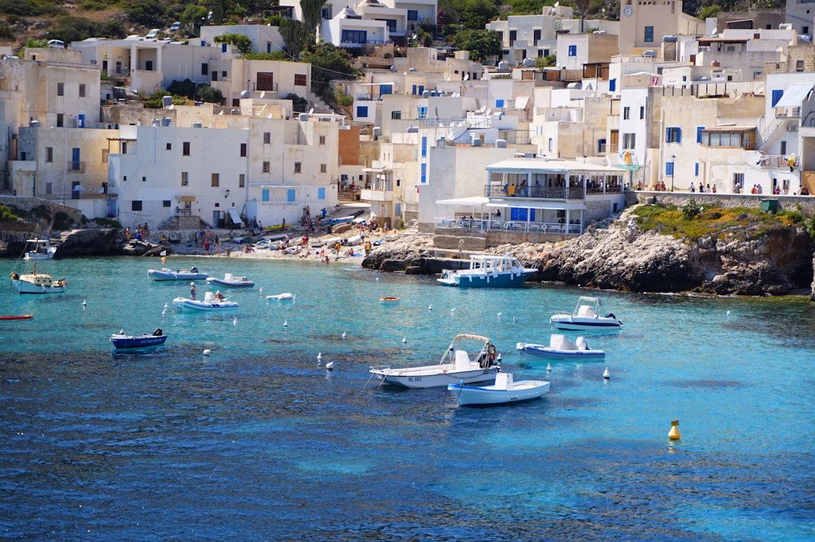 sail boats floating on the coast of Trapani