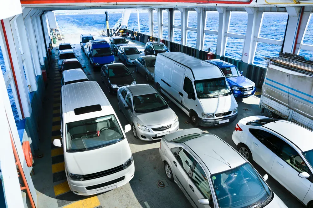 vehicles queing up to board a ferry